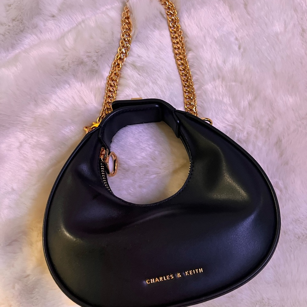 Charles & Keith Black and Gold Mini Crescent Shoulder Bag